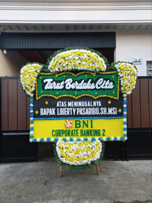 Papan Bunga Duka di Moyag Tampoan