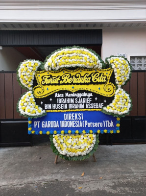 Papan Bunga Duka di Moyag Tampoan