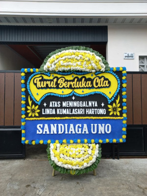 Papan Bunga Duka di Moyag Tampoan